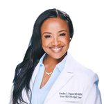 Headshot of Dr. Kendra L. Segura MD MPH, OB/GYN, Her Fantasy Box medical advisor smiling in white coat