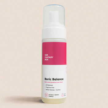 Her Fantasy Box Boric Balance sensitive foam wash bottle with pump on neutral beige background, pH-balanced fragrance-free cleanser for gentle intimate care