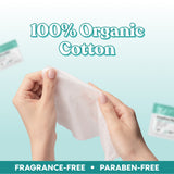 Hands holding one wipe of Her Fantasy Box Everywhere Wipes — 100% organic cotton, fragrance-free and paraben-free