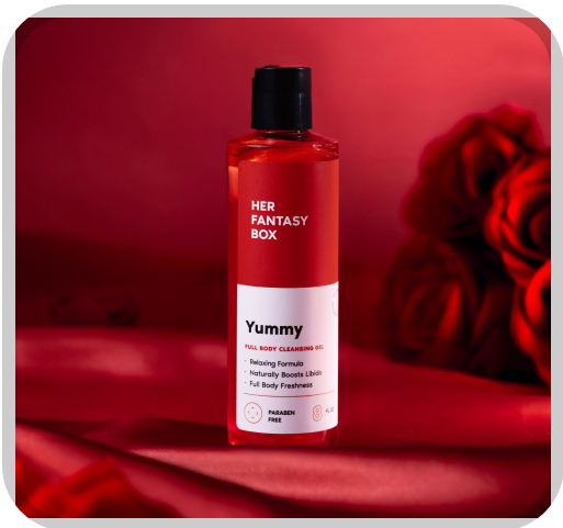 Her Fantasy Box Yummy full body cleansing gel on red satin with roses — relaxing formula, paraben-free