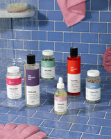 Her Fantasy Box Balance Bundle — Fresh & Clean, Refresh, Body Magic, Renew Her, Yummy, and Slippery Box displayed in a shower setting
