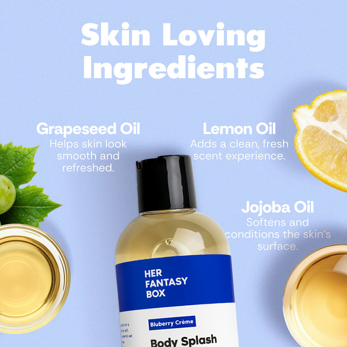 Skin Loving Ingredients. Her Fantasy Box Bluberry Crème Body Splash Hydrating Body Oil. Grapeseed Oil – Helps skin look smooth and refreshed. Lemon Oil – Adds a clean, fresh scent experience. Jojoba Oil – Softens and conditions the skin's surface. Grapeseed leaves, lemon slices, and oil bowls surrounding the bottle.