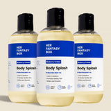 Three bottles of Her Fantasy Box Blueberry Crème Body Splash hydrating body oil displayed together on neutral background