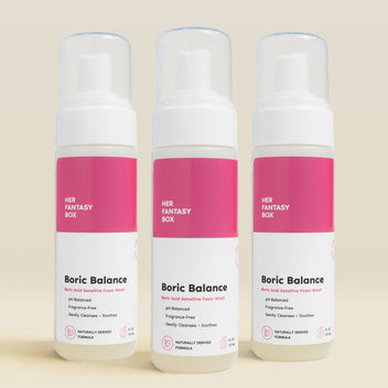 Three bottles of Her Fantasy Box Boric Balance boric acid sensitive foam wash displayed together on neutral beige background, pH-balanced fragrance-free cleanser for gentle intimate care