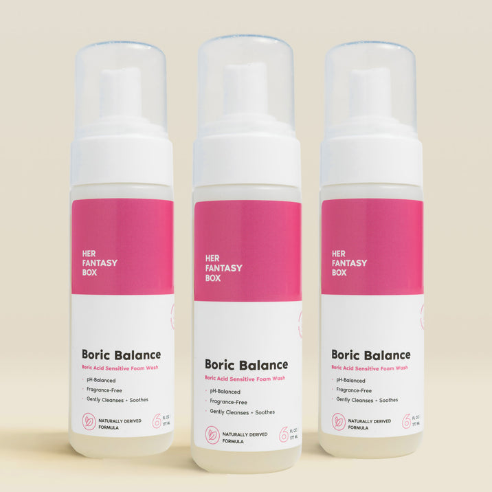 Three bottles of Her Fantasy Box Boric Balance boric acid sensitive foam wash displayed together on neutral beige background, pH-balanced fragrance-free cleanser for gentle intimate care