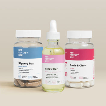 Her Fantasy Box vaginal care bundle featuring Slippery Box, Renew Her oil, and Fresh & Clean suppositories on neutral background