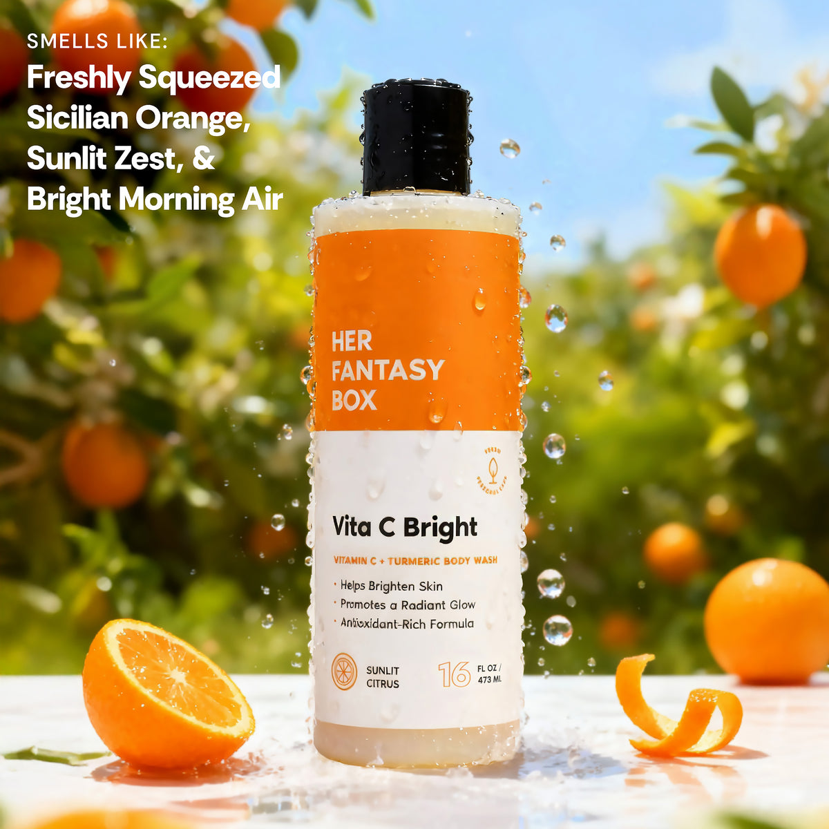Her Fantasy Box Vita C Bright Vitamin C + Turmeric Body Wash. Smells Like: Freshly Squeezed Sicilian Orange, Sunlit Zest, & Bright Morning Air. Bottle label: Helps Brighten Skin, Promotes a Radiant Glow, Antioxidant-Rich Formula. Sunlit Citrus. 16 FL OZ / 473 ML.