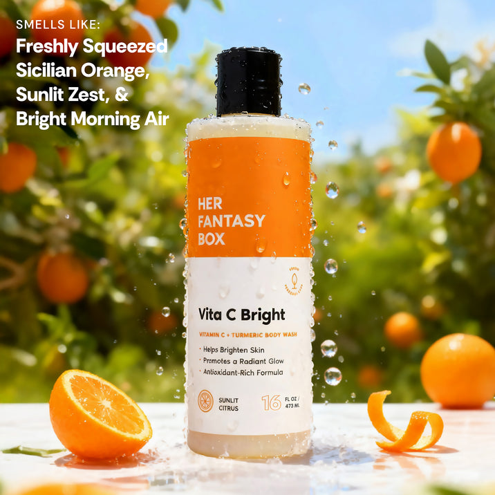 Her Fantasy Box Vita C Bright Vitamin C + Turmeric Body Wash. Smells Like: Freshly Squeezed Sicilian Orange, Sunlit Zest, & Bright Morning Air. Bottle label: Helps Brighten Skin, Promotes a Radiant Glow, Antioxidant-Rich Formula. Sunlit Citrus. 16 FL OZ / 473 ML.