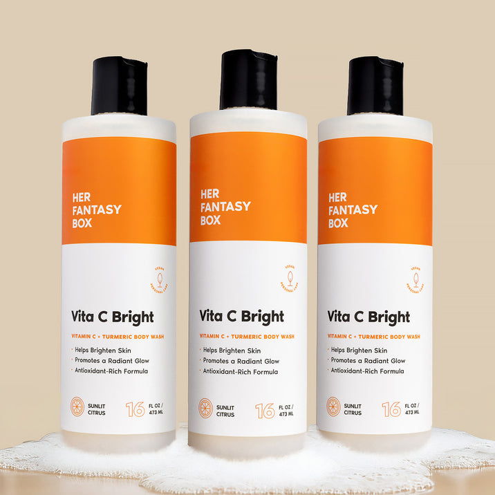 Three bottles of Her Fantasy Box Body Vitamins Vitamin C Citrus Burst multi-vitamin body wash 16 fl oz displayed together on neutral background